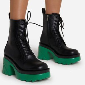 GREEN CLEATED SOLE BLOCK HEEL  BOOTS IN BLACK FAUX LEATHER
